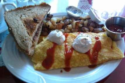 Mexican Omelet W/ red river toast and home fries.